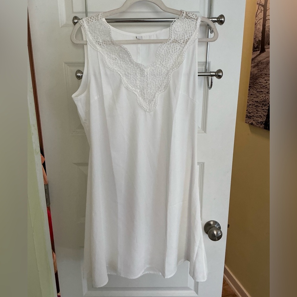 Stylish White Dress with Lace Accents